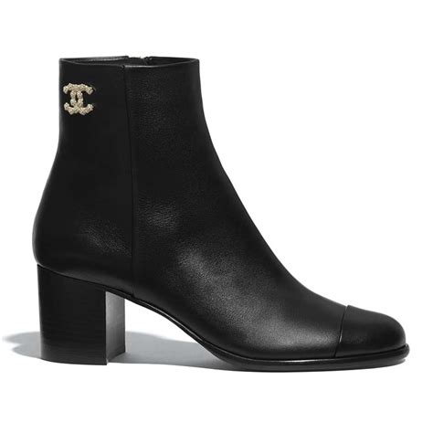 cheap chanel boots|Chanel black canvas heel boots.